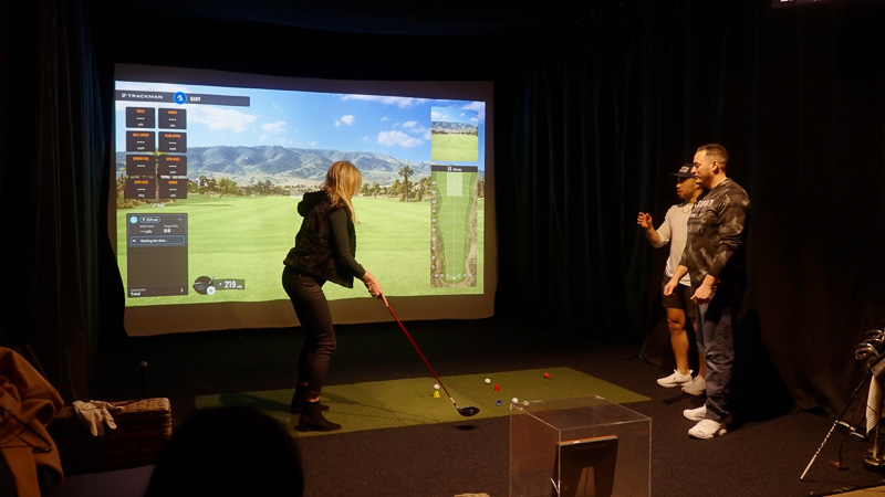 Group enjoying golf suite